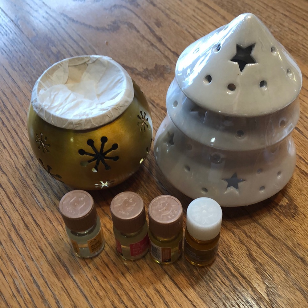 Lot of the Body Shop oil burners and oil.